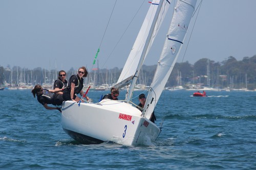 Claudia Pierce and crew hiking their way to the top mark - 20th Harken International Youth Match Racing Championships &copy; Damian Devine